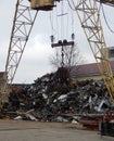 Grabber Crane Machine Loading Rusty Metal Scrap On The Scrapyard