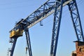 Gantry crane with hook for lifting and moving heavy cruz. Construction site. Industrial plant Royalty Free Stock Photo
