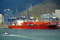 Gantry cranes over the container ship in port of Yantian, China.