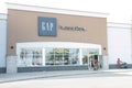 tor, canada - august 17, 2023: gap factory store outlet building clothing apparel with customer exiting walking 222 p 17