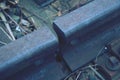 Gap with nut and on the old rusty rail. Rusty train railway detail, oiled sleepers Royalty Free Stock Photo