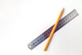 Gaphite simple wood pencil with ruler on table isolated Royalty Free Stock Photo
