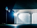 Garage and basketball hoop at night. Royalty Free Stock Photo