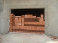 Garage closed with red bricks