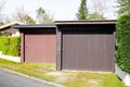 Garage closed two brown door on private residential house