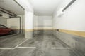 Garage with concrete track in residential apartment buildin Royalty Free Stock Photo