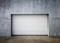 Garage Door in Unfinish Exterior Concrete Wall Royalty Free Stock Photo