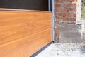 Garage doors installation.Close up of sectional panels in metal profil. Royalty Free Stock Photo