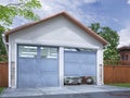 Garage entrance with sectional doors.