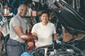garage mechanic worker team hand shaking together for working together auto car service Royalty Free Stock Photo
