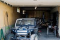 Garage in the mountains, where the Russians collect the jeep themselves for the competition