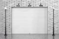 Garage Rolling Shutter Gate Door with Brick Wall and Street Lights. 3d Rendering