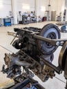 In the garage there is an opened engine block of a car Royalty Free Stock Photo