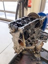 In the garage there is an opened engine block of a car Royalty Free Stock Photo