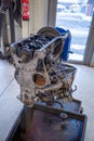 In the garage there is an opened engine block of a car Royalty Free Stock Photo