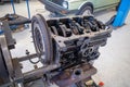 In the garage there is an opened engine block of a car Royalty Free Stock Photo
