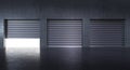 garages with metal shutters and concrete wall, light inside