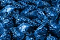 Background Garbage pile of trash bags, blue Bin,Trash, Garbage, Rubbish, Plastic Bags pile Royalty Free Stock Photo