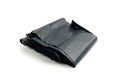 Garbage Bag Isolated. Folded Trash Package, New Rolled Plastic Bin Bags, Black Polyethylene Container Royalty Free Stock Photo