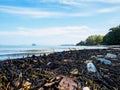Garbage on a beach, environmental pollution of the sea concept. Royalty Free Stock Photo