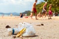 Garbage on a beach left by tourists. Royalty Free Stock Photo