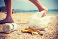 Garbage on a beach left by tourists. Royalty Free Stock Photo