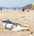 Garbage on a beach, nature pollution concept picture. Royalty Free Stock Photo