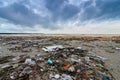 Garbage the beach sea plastic bottle lies on the beach and pollutes the sea and the life of marine life Spilled garbage on the bea