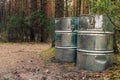 Garbage In Big Metal Containers In Nature, Forest, At River As A Concept Of Spring Cleaning