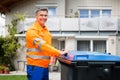 Garbage Bin Collection. Waste Collector With Rubbish