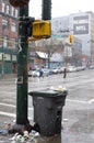 Garbage bin on a sidewalk Royalty Free Stock Photo