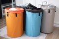 garbage bin with snap-in bag holder and color-coded bags Royalty Free Stock Photo