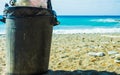 Garbage bin trash can on beach Royalty Free Stock Photo