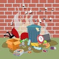 Garbage bin with unsorted waste next to a brick wall. Dirty puddle Royalty Free Stock Photo