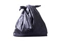 A garbage black bag that tied the mouth nicely. black garbage bag isolated on white background Royalty Free Stock Photo