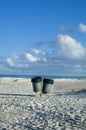 Garbage cans on beach Royalty Free Stock Photo