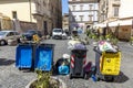 Garbage cans separatet in yellow, reusable, blue - paper and grey - household - in the quarter of Trastevere in Rome, Italy