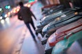 Garbage cans and street lights in urban city, evening Royalty Free Stock Photo