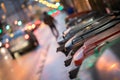 Garbage cans and street lights in urban city, evening Royalty Free Stock Photo