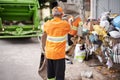 Garbage collection day. a busy garbage collection worker. Royalty Free Stock Photo