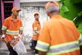 Garbage collection day. a garbage collection team at work. Royalty Free Stock Photo