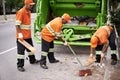 Garbage collection day. a garbage collection team at work. Royalty Free Stock Photo