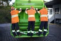 Garbage collection day. a garbage collection team at work. Royalty Free Stock Photo