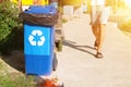 Garbage collection. Waste recycling concept. Blue containers for further processing of garbage. Sunlight Royalty Free Stock Photo