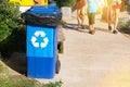 Garbage collection. Waste recycling concept. Blue containers for further processing of garbage. Sunshine Royalty Free Stock Photo