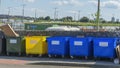Garbage containers for garbage segregation on the street. Colored designations of garbage containers for different types of waste Royalty Free Stock Photo