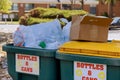 Garbage containers near apartment building in district garbage bins to help separate recycle Royalty Free Stock Photo