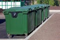 Garbage containers. Plastic garbage containers in the yard of the house