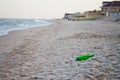 Garbage on a deserted beach pollution Royalty Free Stock Photo