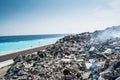 Garbage dump area view full of litter, plastic bottles,rubbish and other trash at the Thilafushi tropical island Royalty Free Stock Photo